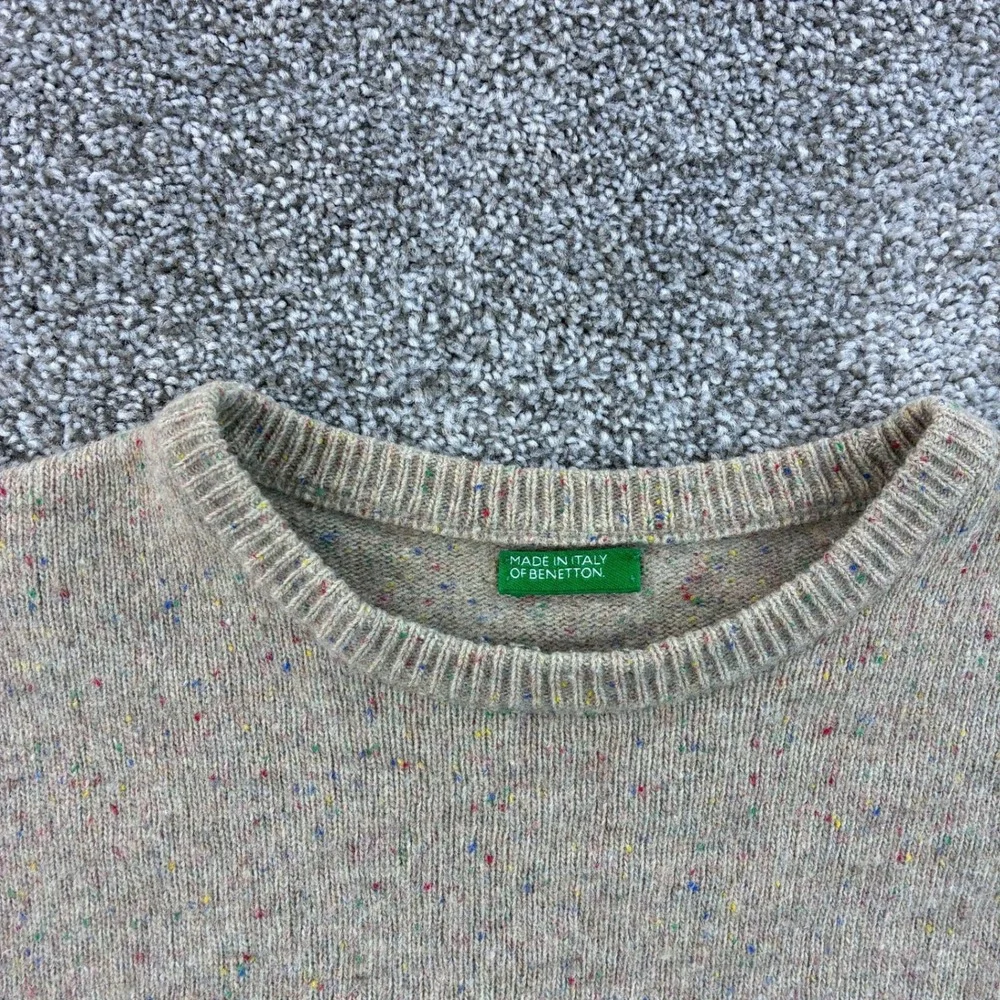 United Colors Of Benetton measures 23in